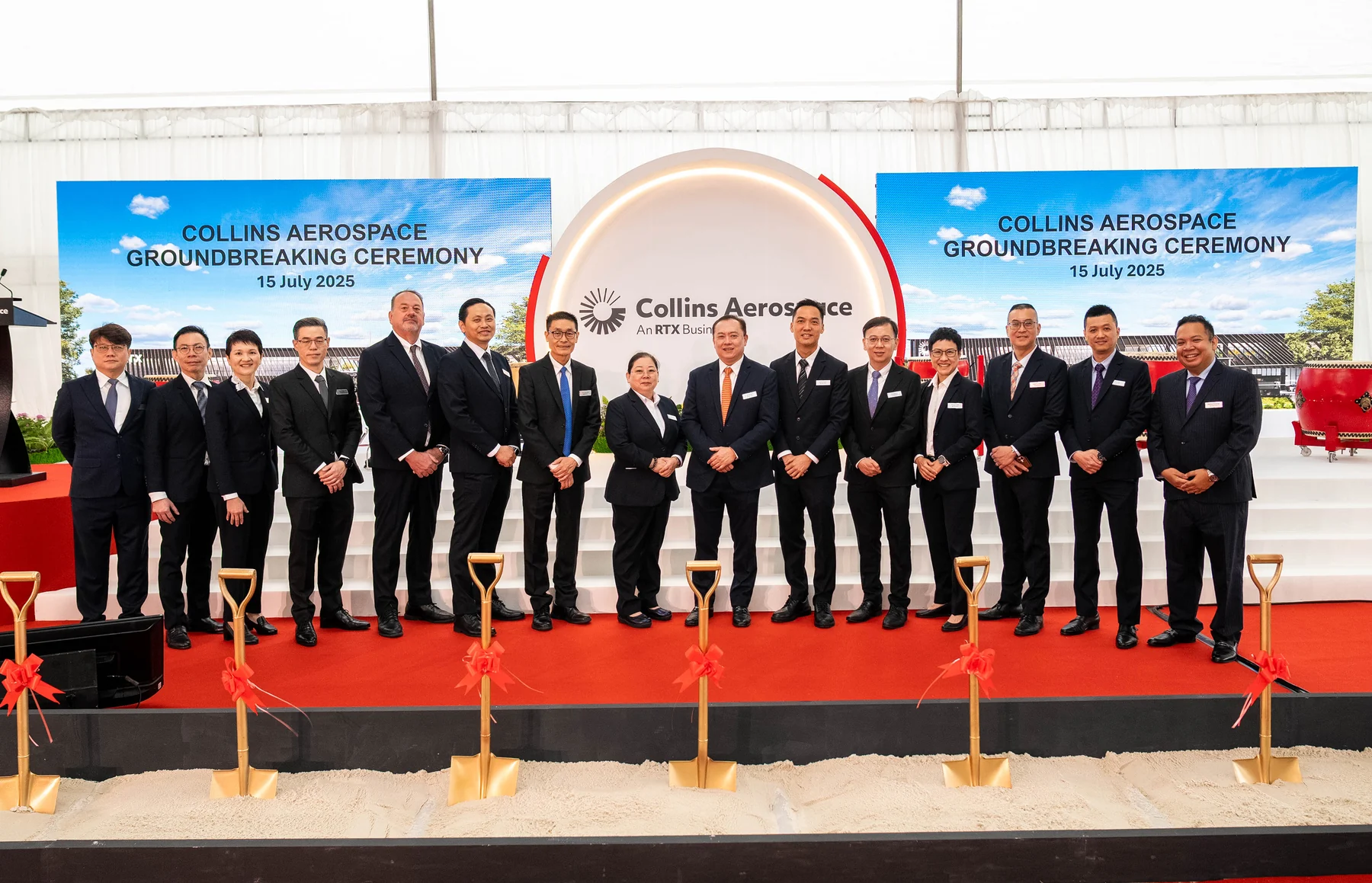 Group photograph at the Collins Aerospace groundbreaking ceremony
